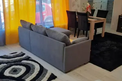 Coin salon dans l'établissement Charmante petite maison