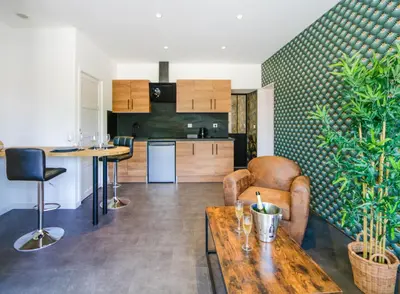 Cuisine ou kitchenette dans l'établissement Suite Spa Privatif