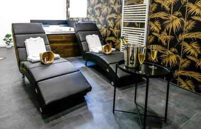 Coin salon dans l'établissement Suite Spa Privatif