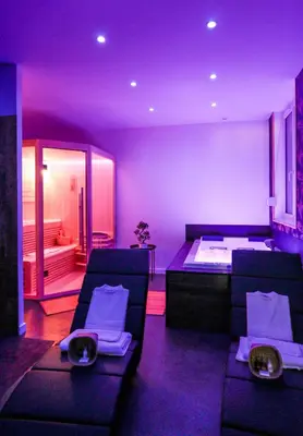 Un ou plusieurs lits dans un hébergement de l'établissement Suite Spa Privatif