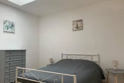 Un ou plusieurs lits dans un hébergement de l'établissement Hyper centre Maison le petit Bouchon