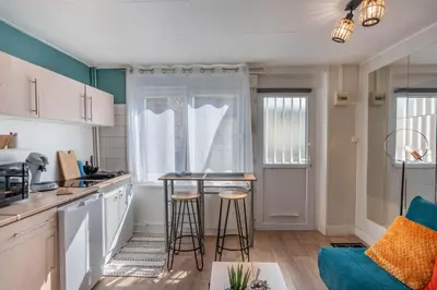 Cuisine ou kitchenette dans l'établissement L'Alexandrin