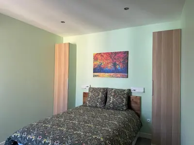 Un ou plusieurs lits dans un hébergement de l'établissement 70m2 climatisé - Parking privé - Terrasse - 2 chambres - Lycée Roosevelt - Reims Arena
