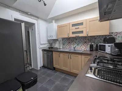 Cuisine ou kitchenette dans l'établissement Street app'Art