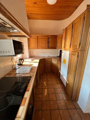 Cuisine ou kitchenette dans l'établissement L’ÉMERAUDE 2
