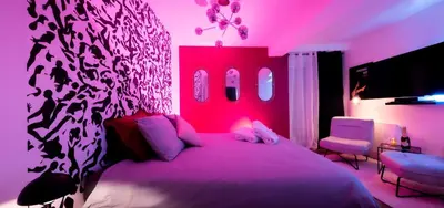 Un ou plusieurs lits dans un hébergement de l'établissement LoveSparadise -Suite Le Secret
