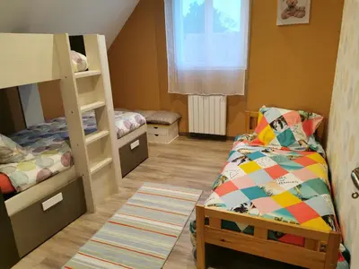 Un ou plusieurs lits dans un hébergement de l'établissement Bienvenue chez moi à Concevreux
