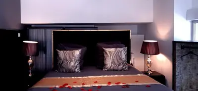 Un ou plusieurs lits dans un hébergement de l'établissement GlamappartSpa Prestige New-York expérience