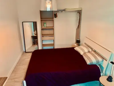 Un ou plusieurs lits dans un hébergement de l'établissement Superbe appartement en hyper centre de Charleville