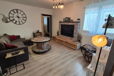 Coin salon dans l'établissement 3 bedrooms and the Moon Terrace 103m2 of charm