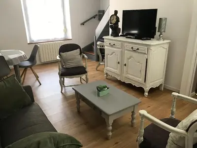 Télévision ou salle de divertissement dans l'établissement Le saint Pierre