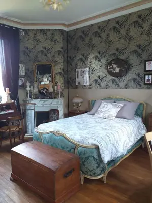 Un ou plusieurs lits dans un hébergement de l'établissement VILLA LES CAMELIAS