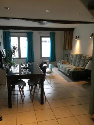 Coin salon dans l'établissement Hébergement à l'Orée des Champs