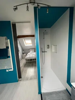 Un ou plusieurs lits dans un hébergement de l'établissement Maison de village chez Josy
