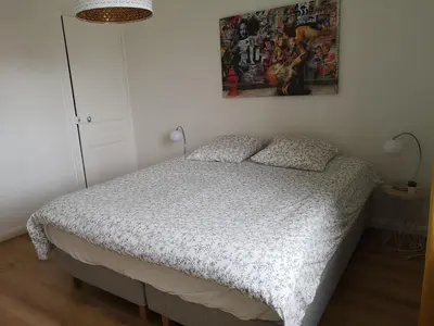Un ou plusieurs lits dans un hébergement de l'établissement Luton Chic