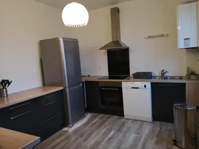 Cuisine ou kitchenette dans l'établissement Luton Chic