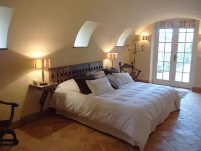 Un ou plusieurs lits dans un hébergement de l'établissement La chambre des vignerons