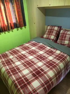 Un ou plusieurs lits dans un hébergement de l'établissement LE CHALET DE CANDICE TOUT CONFORT PECHE COMPRISE