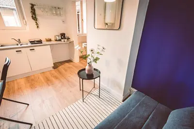 Cuisine ou kitchenette dans l'établissement La Suite - Paisible et à deux pas de la gare