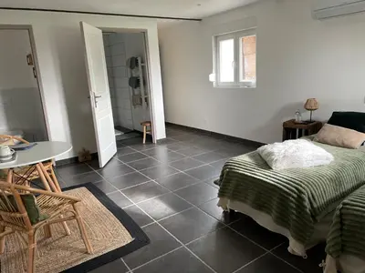 Un ou plusieurs lits dans un hébergement de l'établissement Aux Fines Bulles Chambres d hôtes