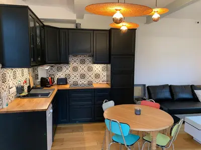 Cuisine ou kitchenette dans l'établissement Maisonnette du coteau ouest - Jardin et terrasse - Epernay