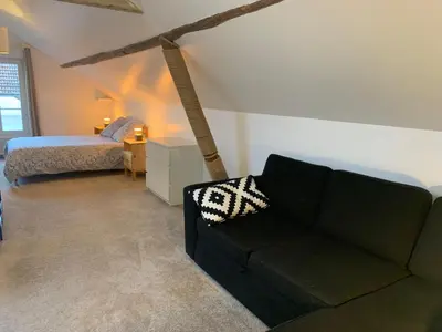 Coin salon dans l'établissement Maisonnette du coteau ouest - Jardin et terrasse - Epernay