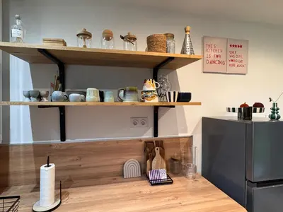 Cuisine ou kitchenette dans l'établissement Le coin qu on M