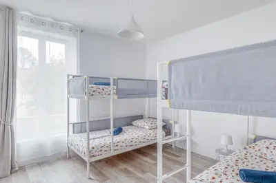 Un ou plusieurs lits dans un hébergement de l'établissement Le 12 - Freedomus Marne-la-Vallée