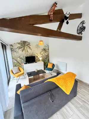 Coin salon dans l'établissement Au petit Jardin Sézannais