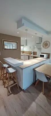 Cuisine ou kitchenette dans l'établissement Gîte 