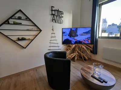 Télévision ou salle de divertissement dans l'établissement Gîte La filature