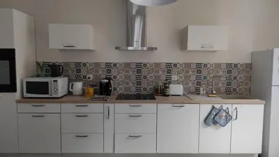 Cuisine ou kitchenette dans l'établissement Bulles d'Evasion
