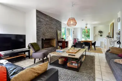 Coin salon dans l'établissement Maison de charme à la campagne