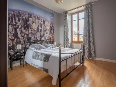Un ou plusieurs lits dans un hébergement de l'établissement Vintage Holiday Home in Nouart