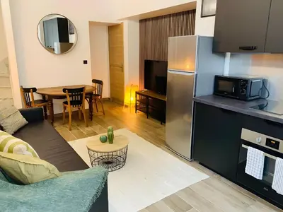 Cuisine ou kitchenette dans l'établissement Le Charmant Bailla Science-Po