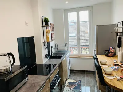 Cuisine ou kitchenette dans l'établissement Nice cocooning apartment for a relaxing moment