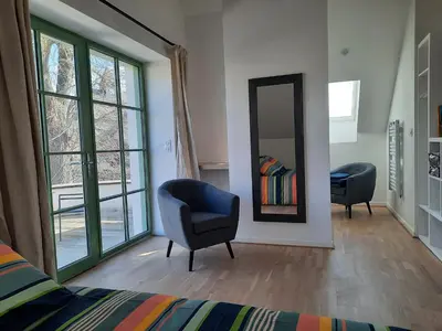 Coin salon dans l'établissement LE RELAIS
