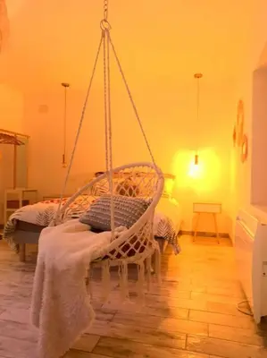 Un ou plusieurs lits dans un hébergement de l'établissement Cottage Interieur Spa classé 4 étoiles - balnéo et sauna privatif