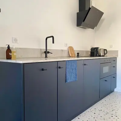 Cuisine ou kitchenette dans l'établissement La Cour Tellier