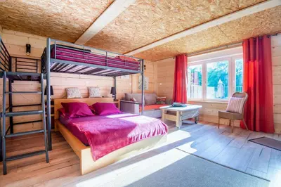 Un ou plusieurs lits dans un hébergement de l'établissement Villa spacieuse à Sapogne-et-Feuchères avec piscine privée, 150 m²
