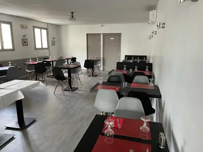 Coin salon dans l'établissement HÔTEL RESTAURANT LE PICARDIE