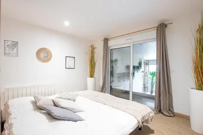 Un ou plusieurs lits dans un hébergement de l'établissement Loft Détente Fun Champagne Experience
