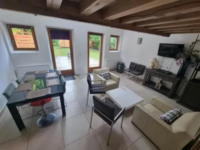 Télévision ou salle de divertissement dans l'établissement Villa Primerose