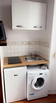 Cuisine ou kitchenette dans l'établissement Reims confort