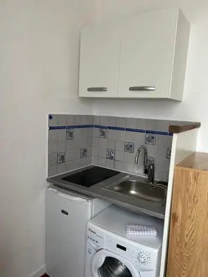 Cuisine ou kitchenette dans l'établissement Reims Authentique
