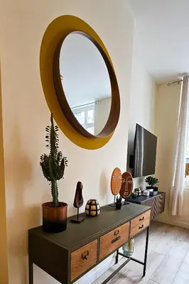 Télévision ou salle de divertissement dans l'établissement Les Appartements de la Nef d'Or