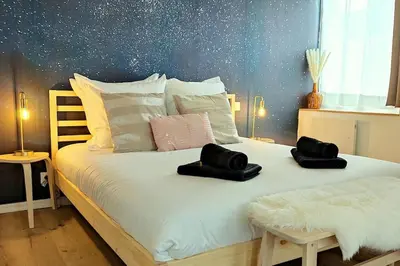 Un ou plusieurs lits dans un hébergement de l'établissement NOUVEAU*Le Bois étoilé*Balnéo*Massage*Détente*Wifi*Netflix*Self-checkin