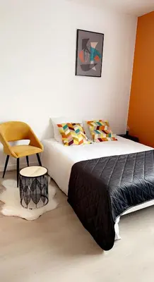 Un ou plusieurs lits dans un hébergement de l'établissement Reims voyage