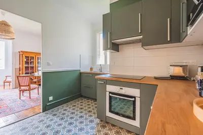 Cuisine ou kitchenette dans l'établissement MOULINS - Maison cosy au cœur de Reims