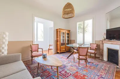 Coin salon dans l'établissement MOULINS - Maison cosy au cœur de Reims